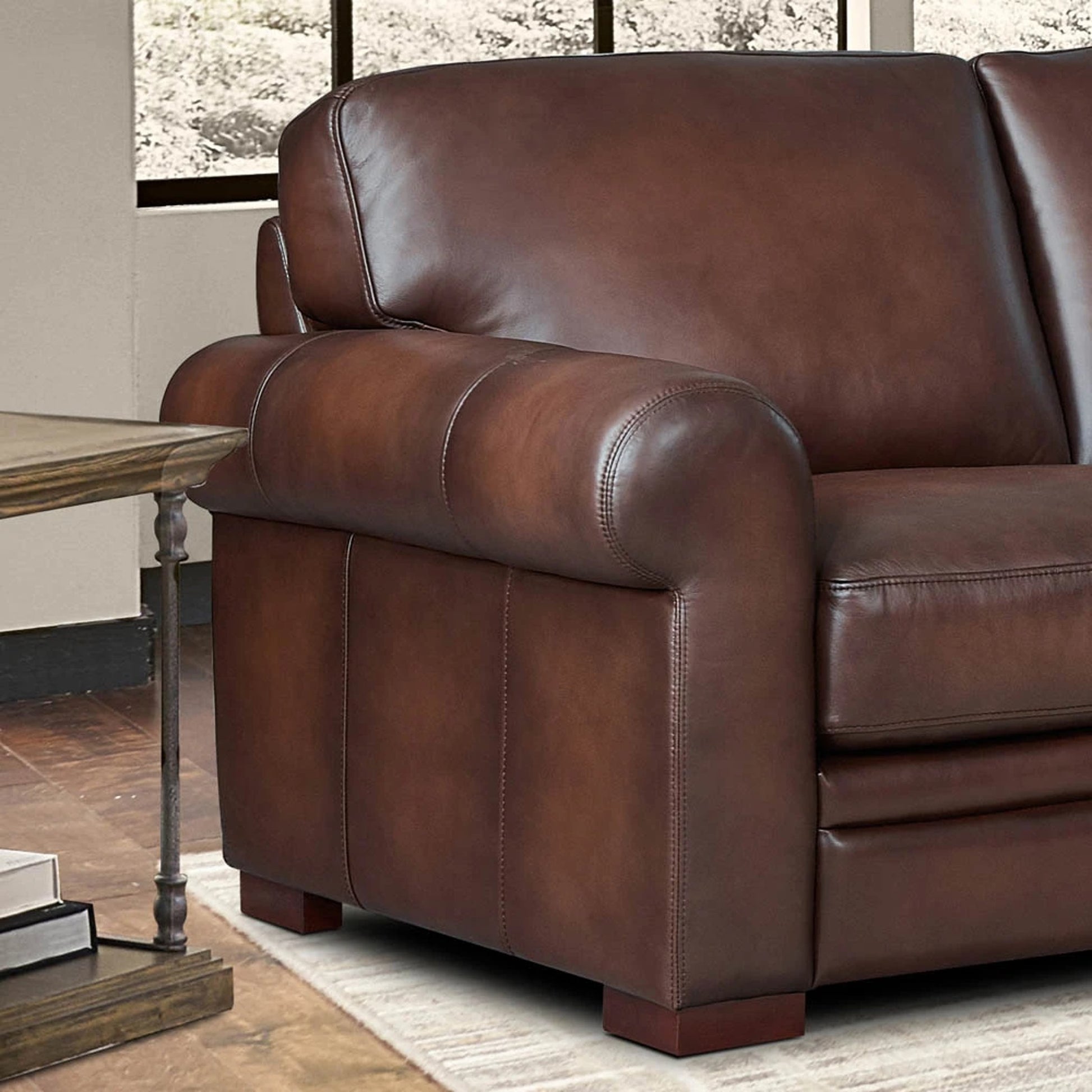 Brookfield Loveseat by Hydeline in caramel brown. Made from leather in a transitional style.
