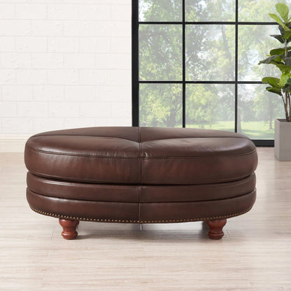 Belfast Ottoman by Hydeline in ash gray. Made from leather in a transitional style.