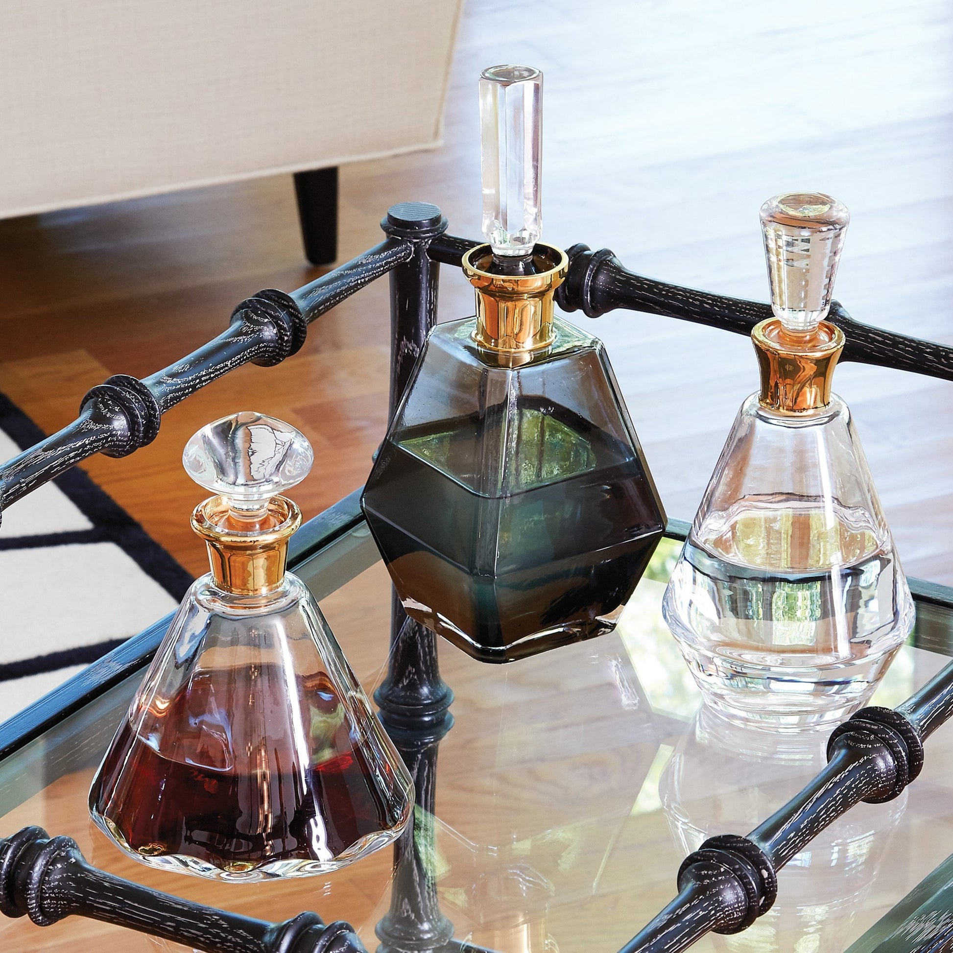 Cone Decanter by Global Views. Made from glass in a transitional style.
