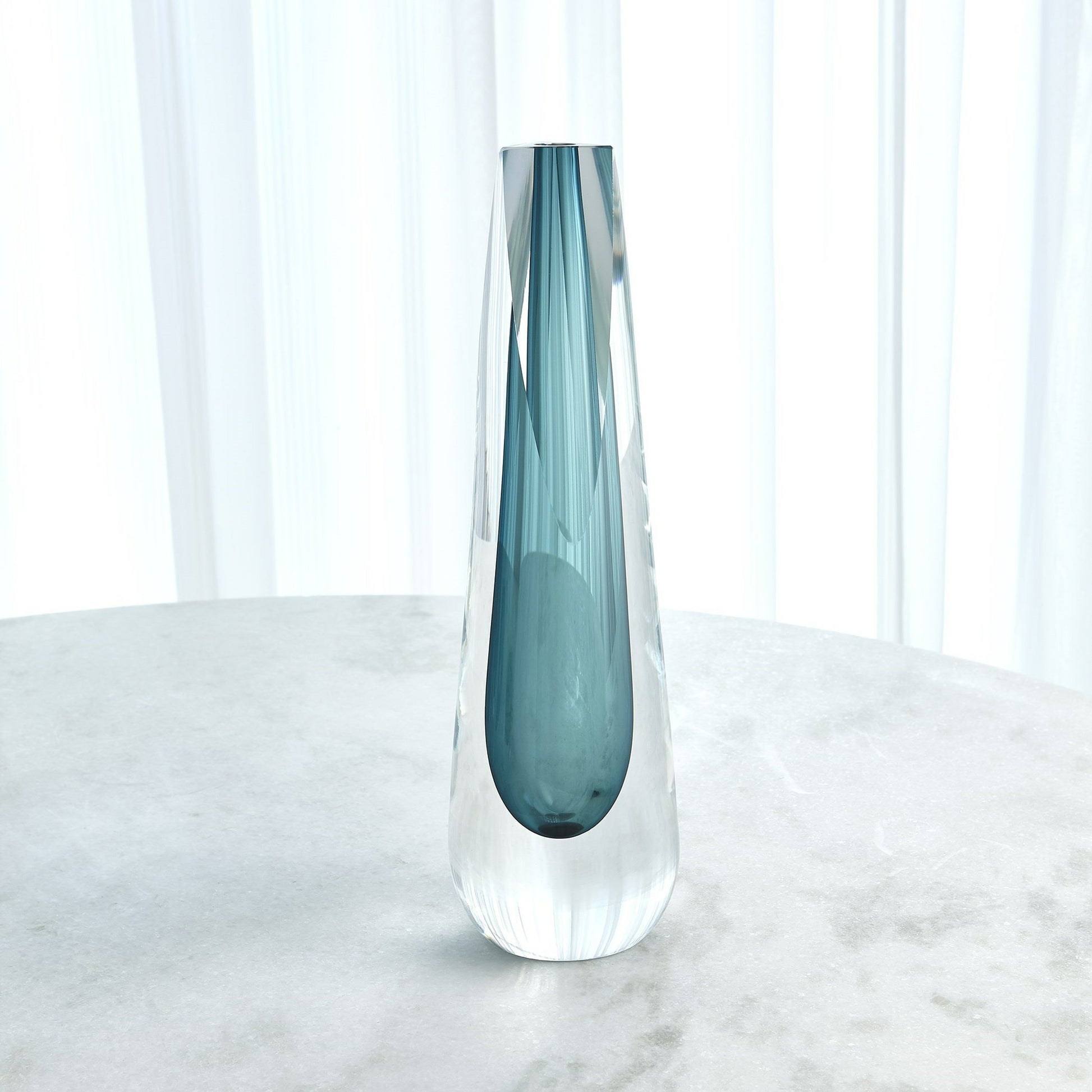 Triangle Cut Glass Vase by Global Views. Made from art glass in a modern style.