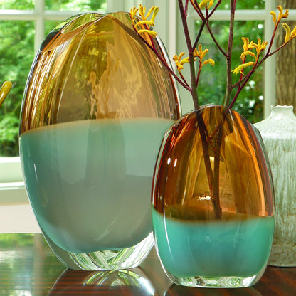 Pistachio Bubble Amber Oval Vase by Global Views. Made from art glass in a coastal style.