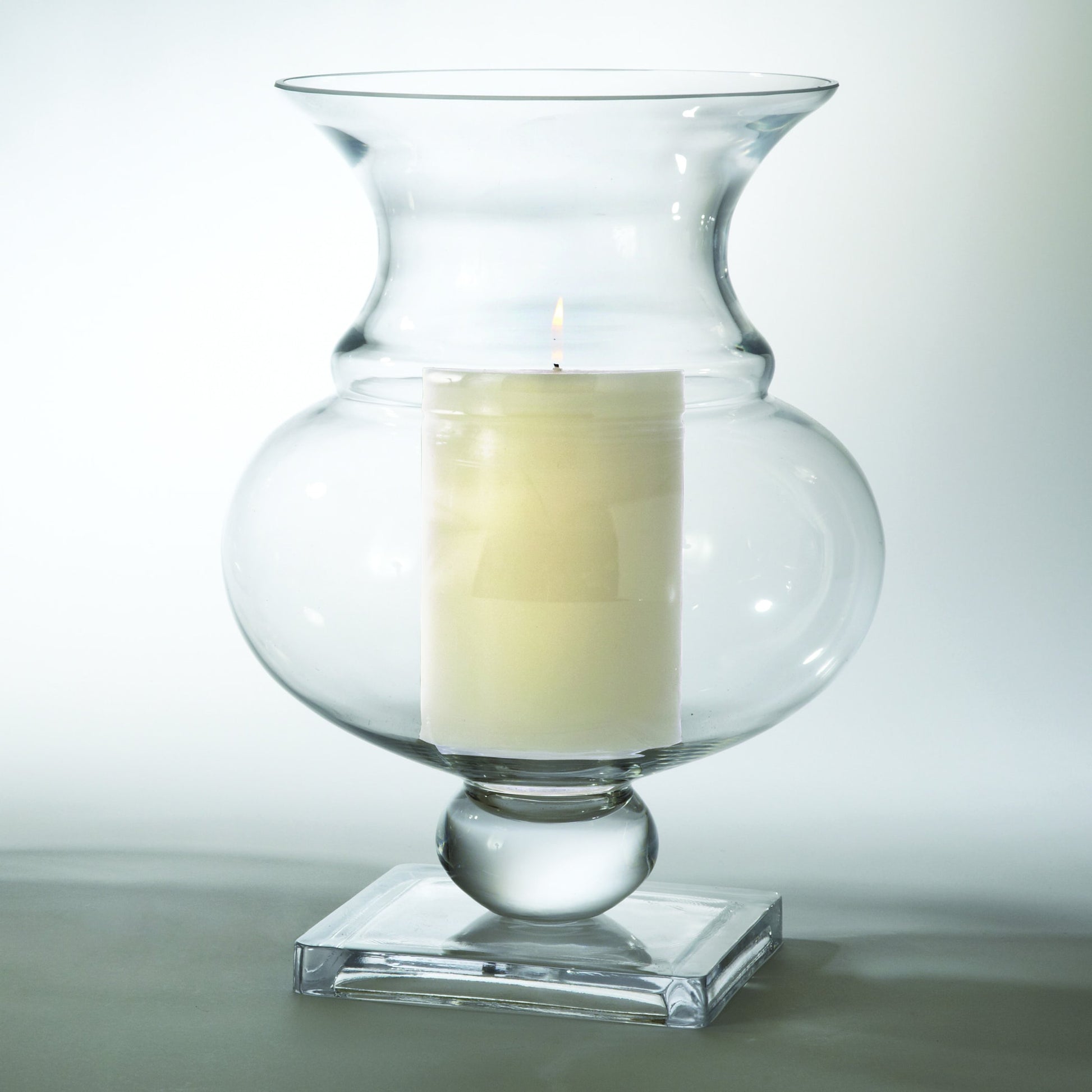 Charleston Hurricane Vase by Global Views. Made from glass in a transitional style.