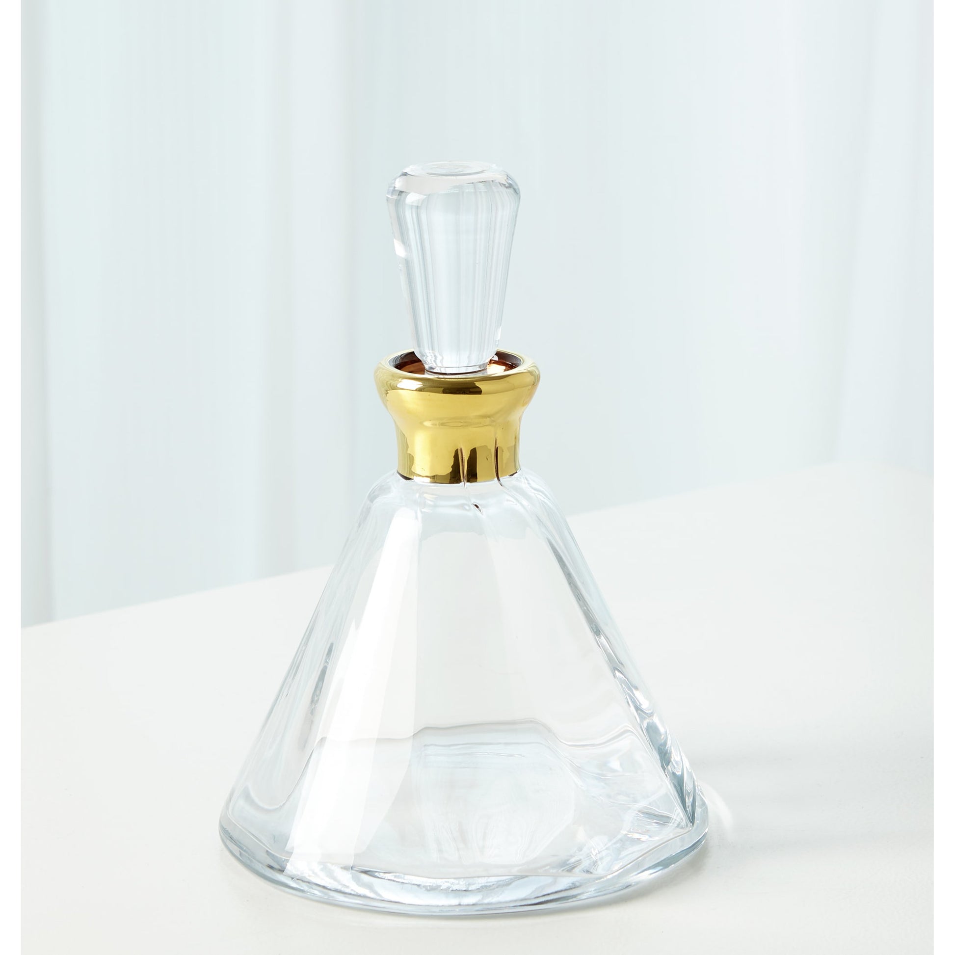 Cone Decanter by Global Views. Made from glass in a transitional style.