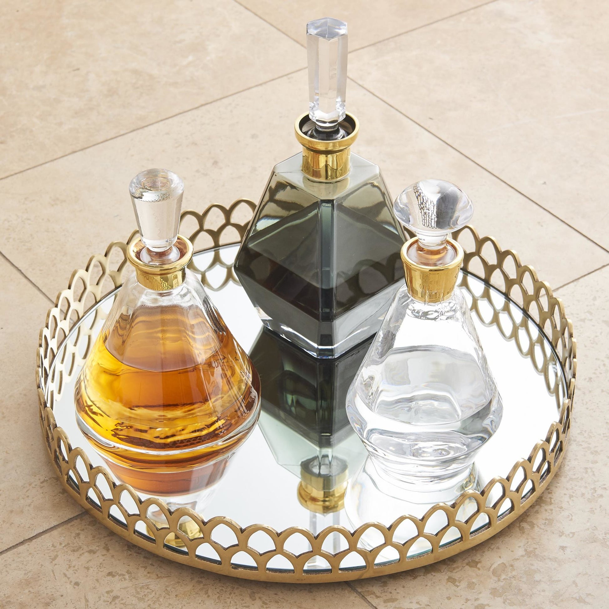 Pri Decanter by Global Views. Made from glass in a transitional style.