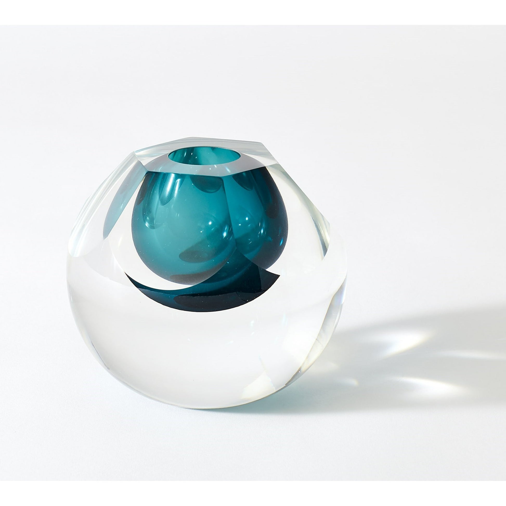 Hexagon Cut Glass Vase by Global Views. Made from art glass in a coastal style.