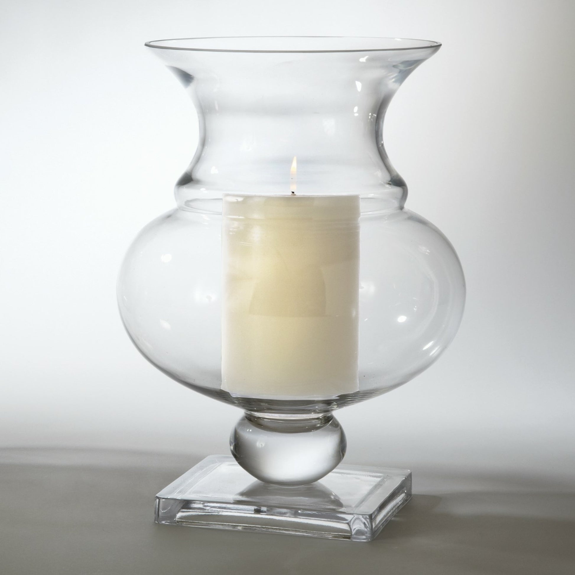 Charleston Hurricane Vase by Global Views. Made from glass in a transitional style.