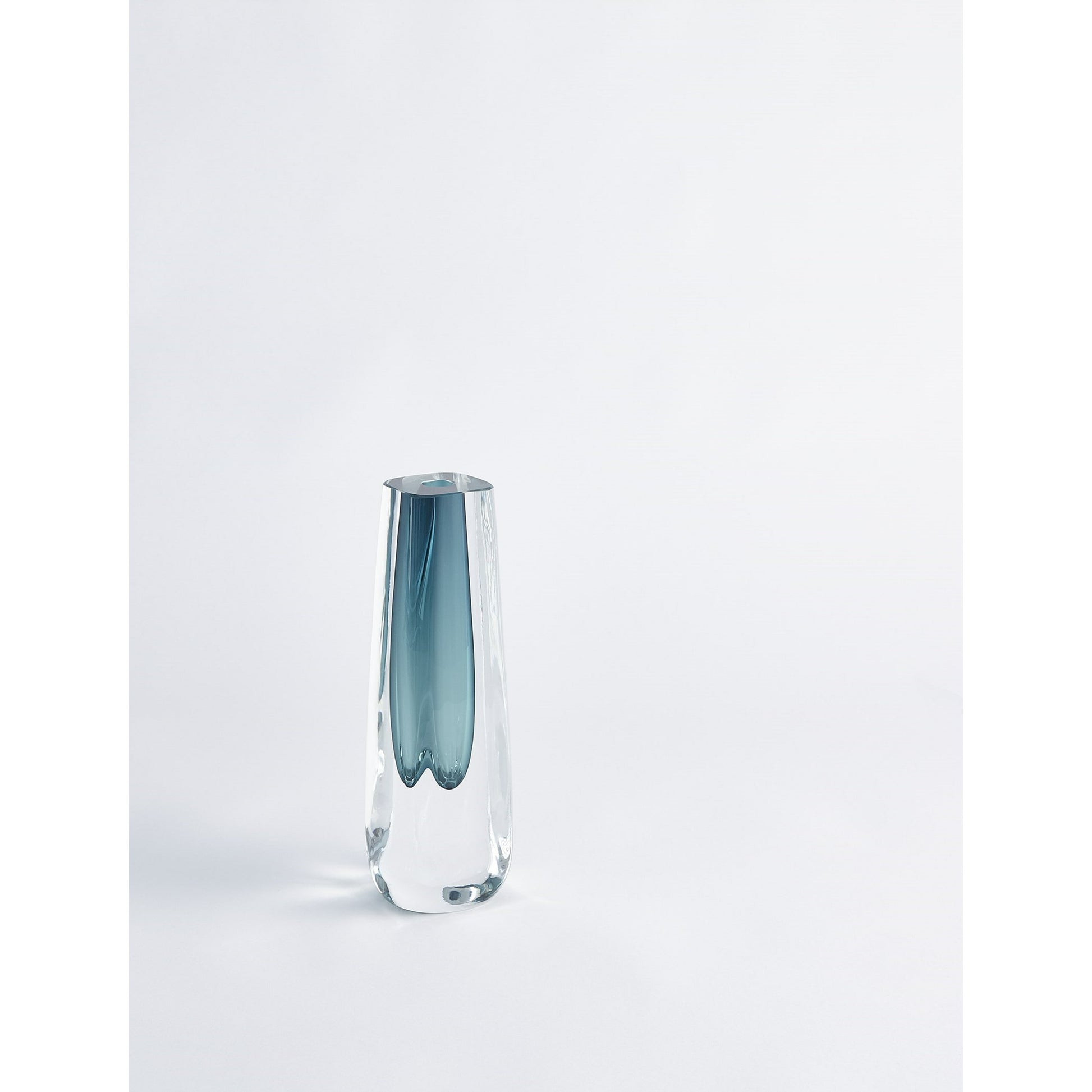 Square Cut Glass Vase by Global Views. Made from art glass in a coastal style.