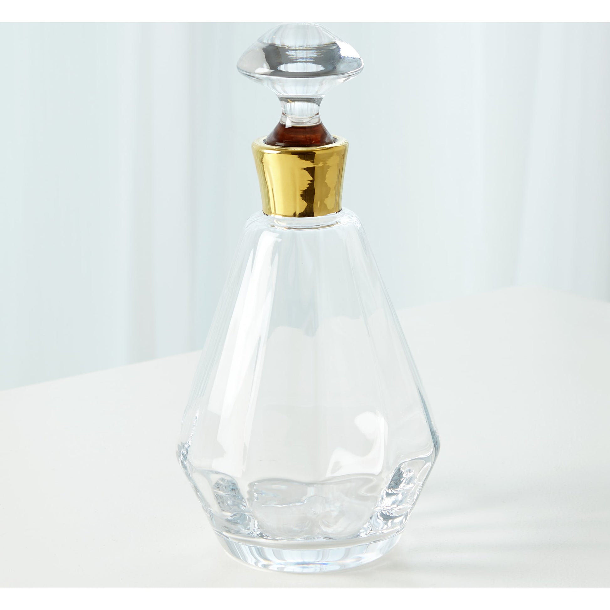 Pri Decanter by Global Views. Made from glass in a transitional style.