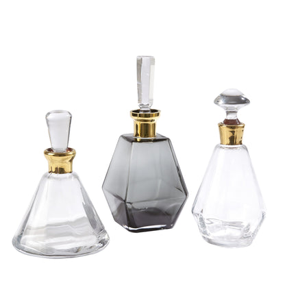 Cone Decanter by Global Views. Made from glass in a transitional style.