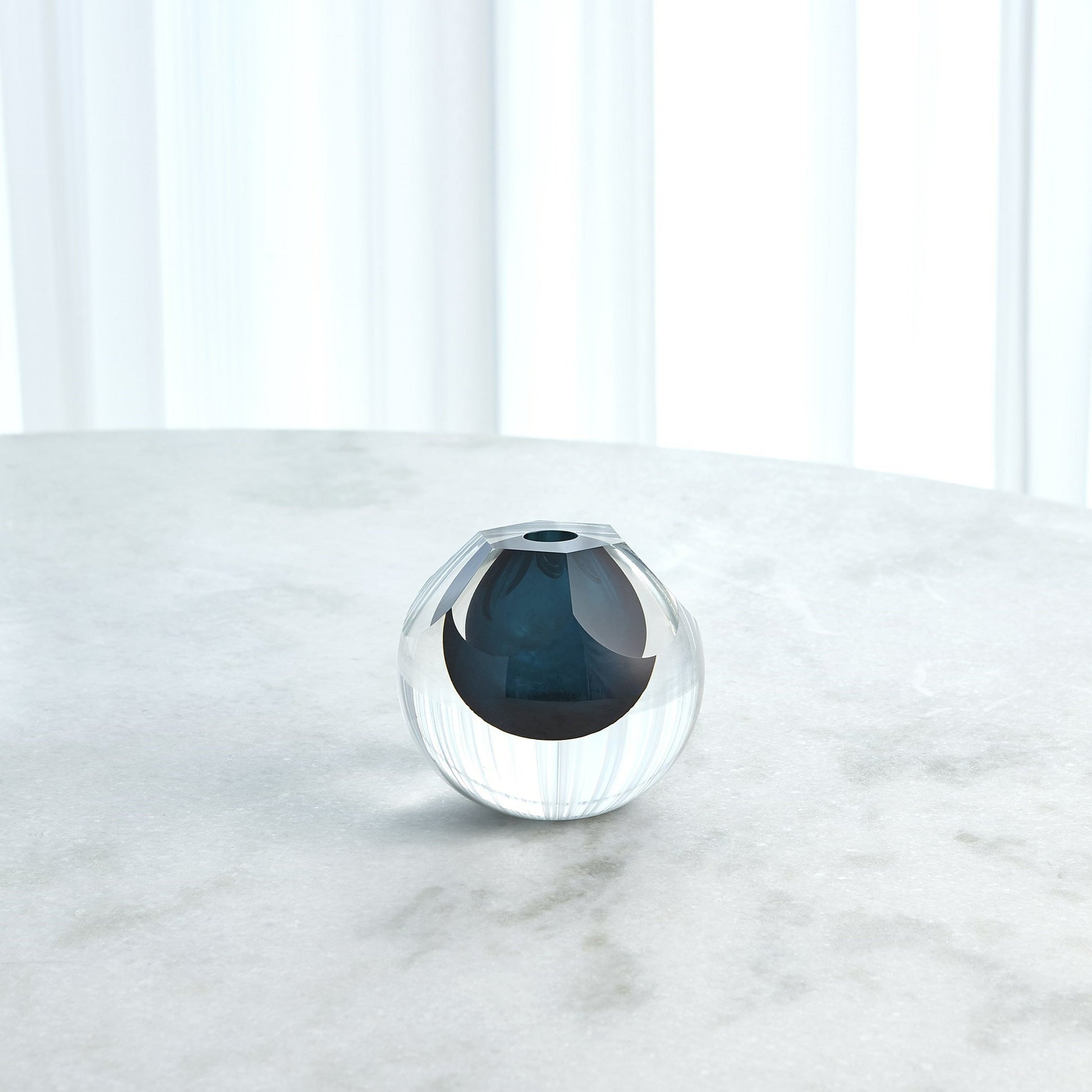 Hexagon Cut Glass Vase by Global Views. Made from art glass in a coastal style.