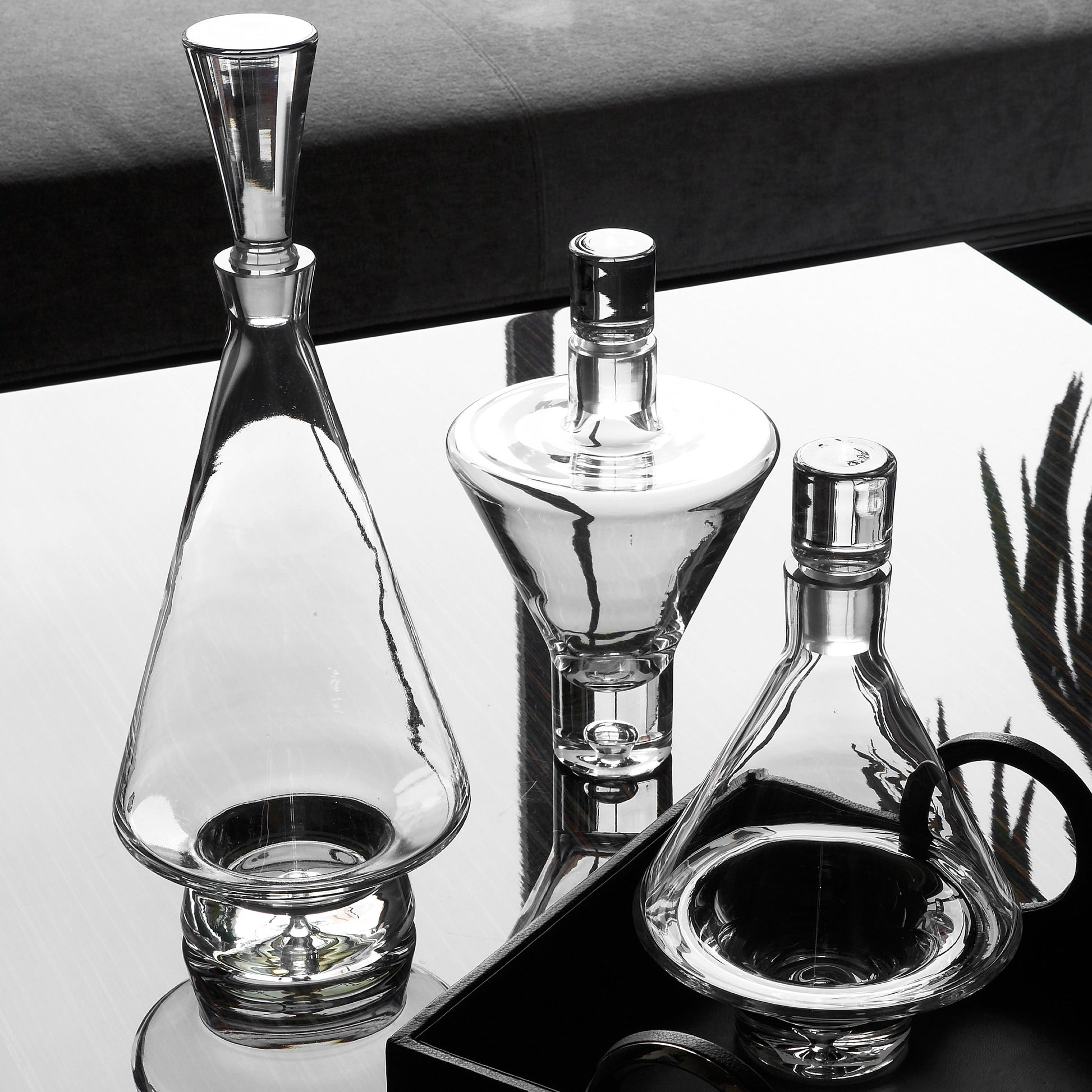 Fat Bottom Decanter by Global Views. Made from glass in a modern style.