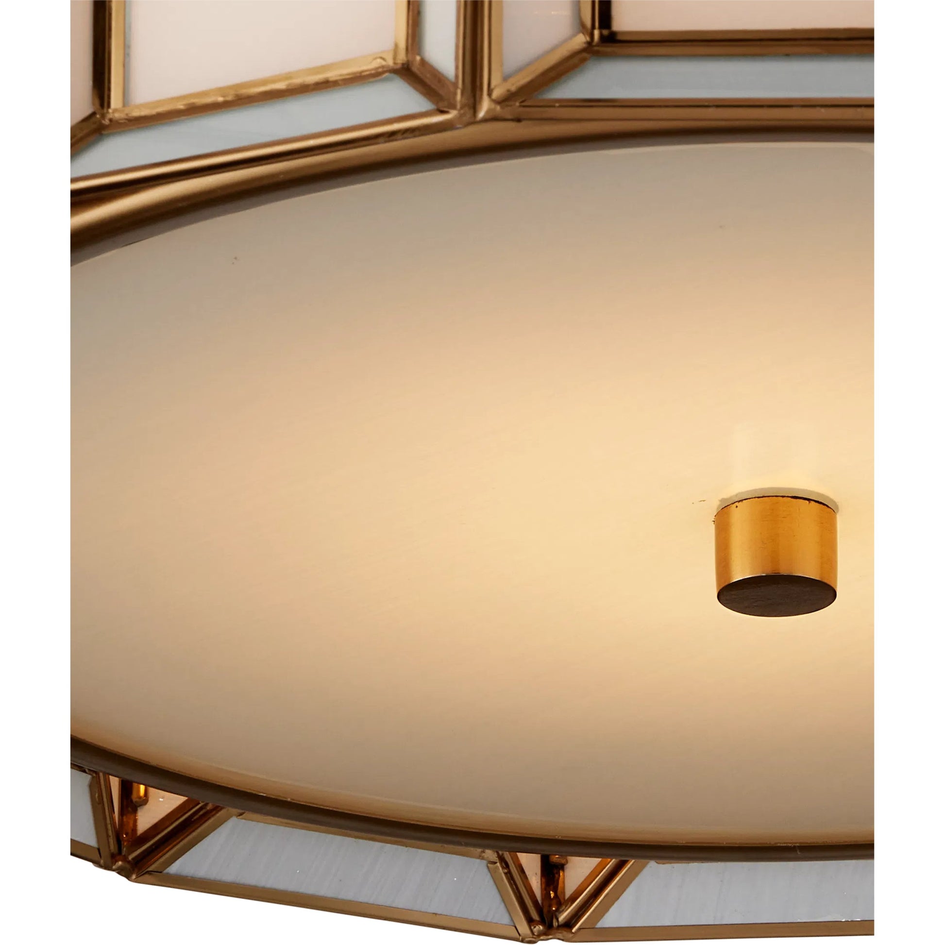 Daze Flush Mount by Currey and Company in antique brass, white. Made from brass, hand-painted glass, metal in a traditional style.