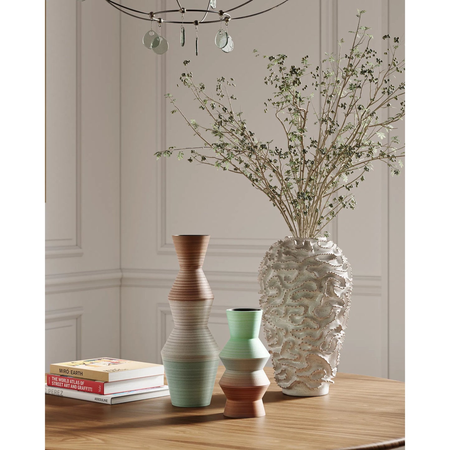 008 SR-823787 | Lifestyle | Swirl Vase by Currey and Company in white, gold. Made from ceramic in a coastal style.