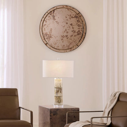 Chambord Mirror by Jamie Young in antique brass. Made from glass in a unique style.