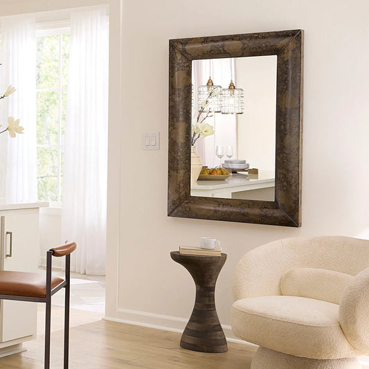 Empire Mirror by Jamie Young in antique brass and acid wash patina finish. Made from iron in a unique style.