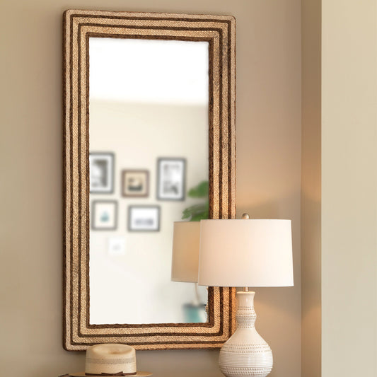 Evergreen Mirror by Jamie Young. Made from braided seagrass in a coastal style.