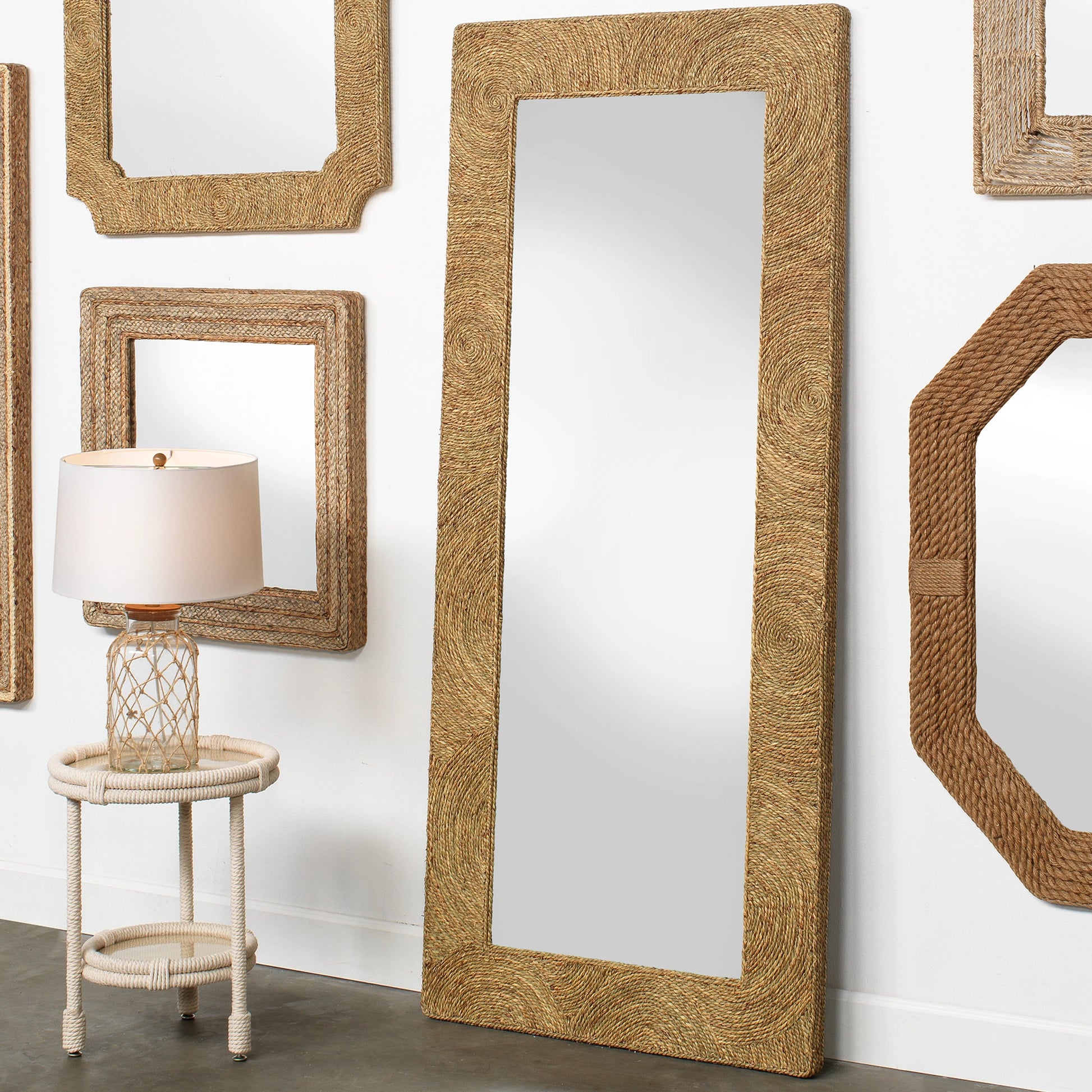 Harbor Floor Mirror by Jamie Young in natural seagrass. Made from seagrass in a coastal style.