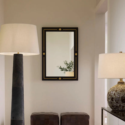 Lloyd Mirror by Jamie Young in black. Made from wood in a unique style.