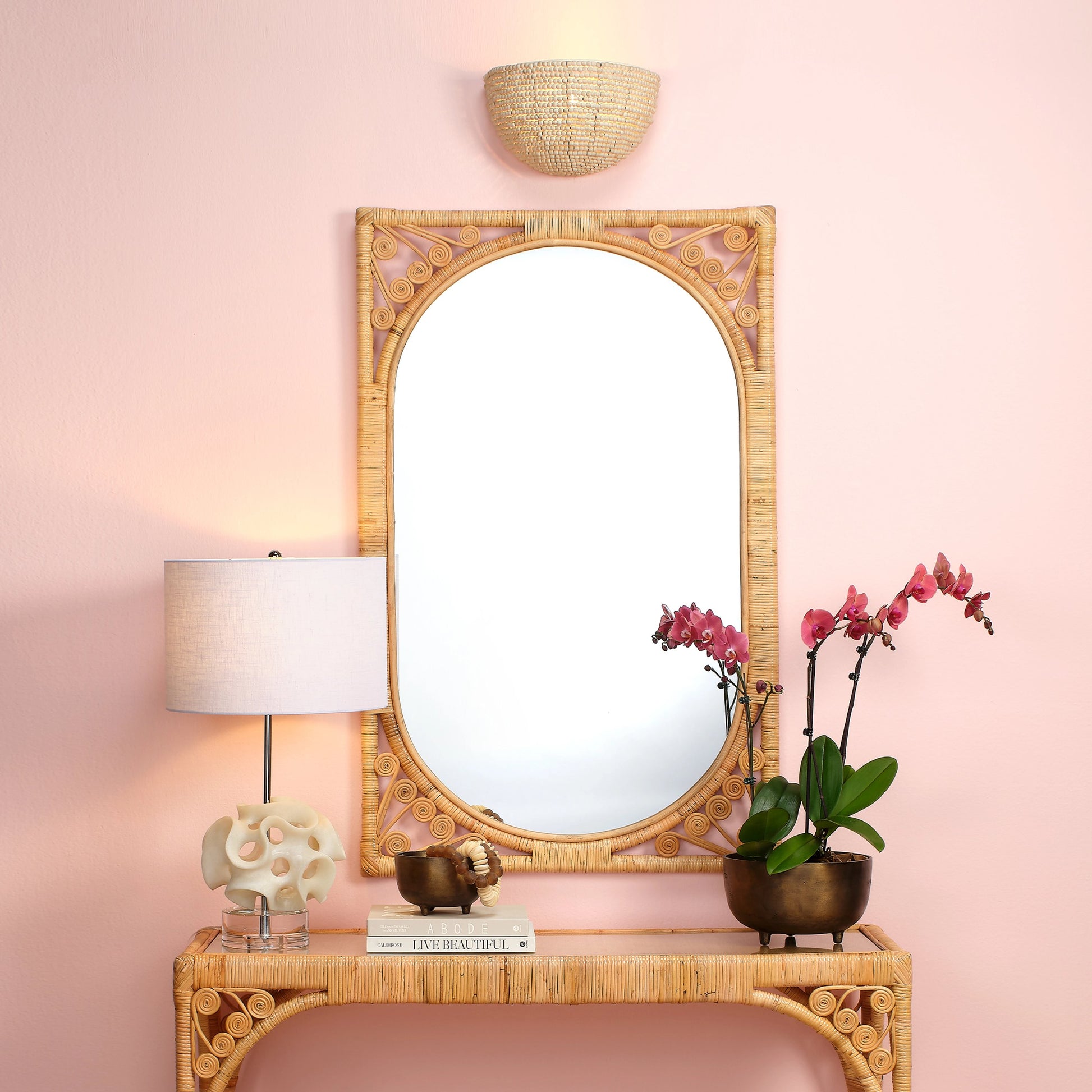 Primrose Mirror by Jamie Young. Made from rattan in a cottage & farmhouse style.