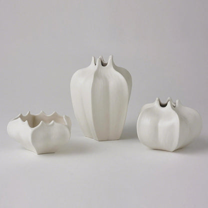 Star Fruit Vase by Global Views. Made from ceramic in a coastal style.