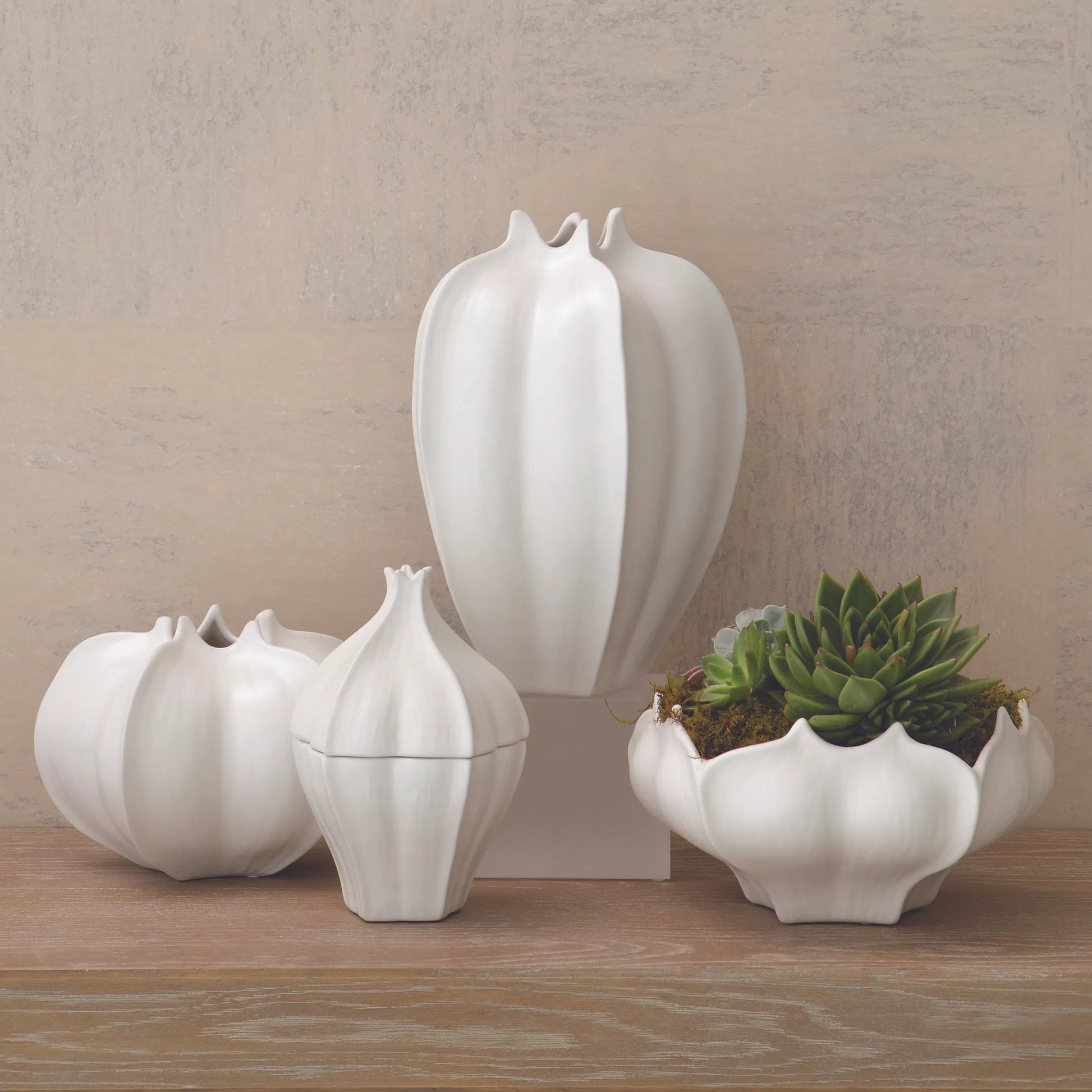 Star Fruit Vase by Global Views. Made from ceramic in a coastal style.