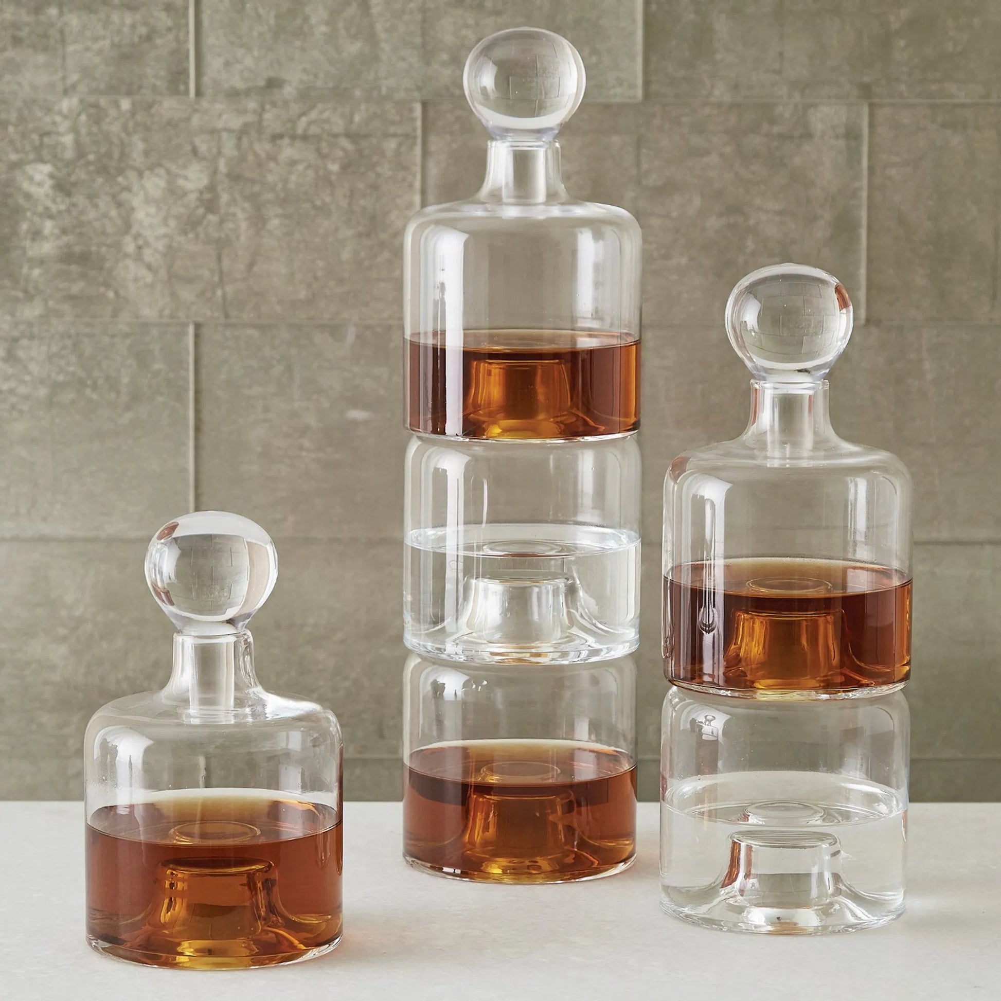 Stac Decanter by Global Views. Made from glass in a transitional style.