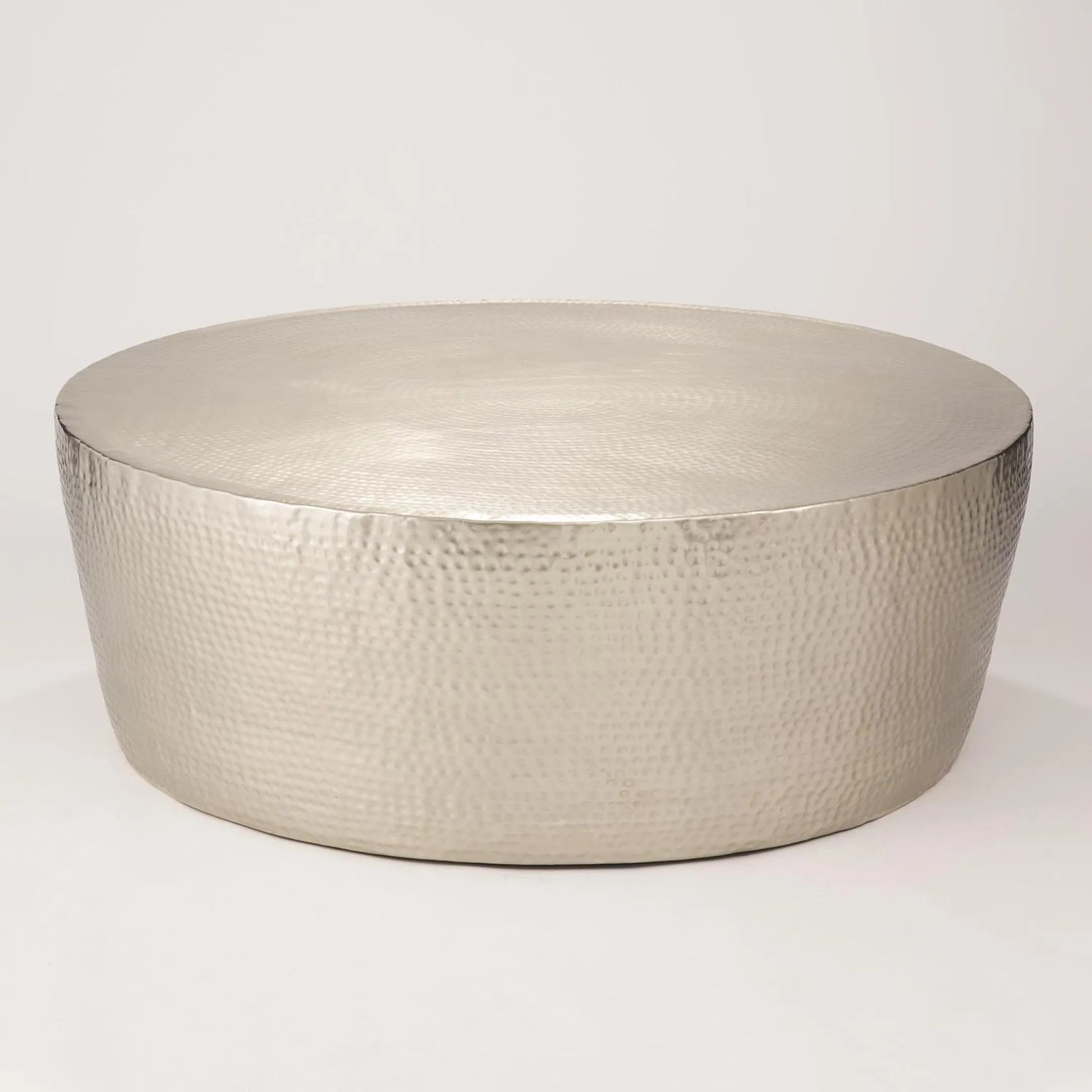 Izmir Hammered Cocktail Table by Global Views. Made from brass in a eclectic & global style.