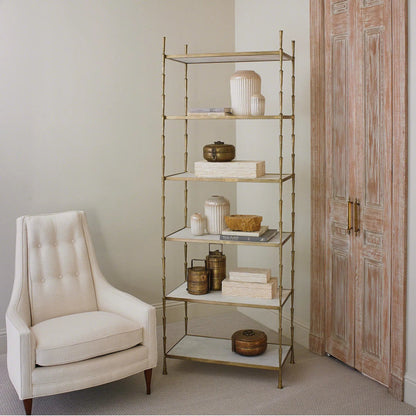 Spike Etagere by Global Views in antique brass. Made from iron, white marble in a transitional style.