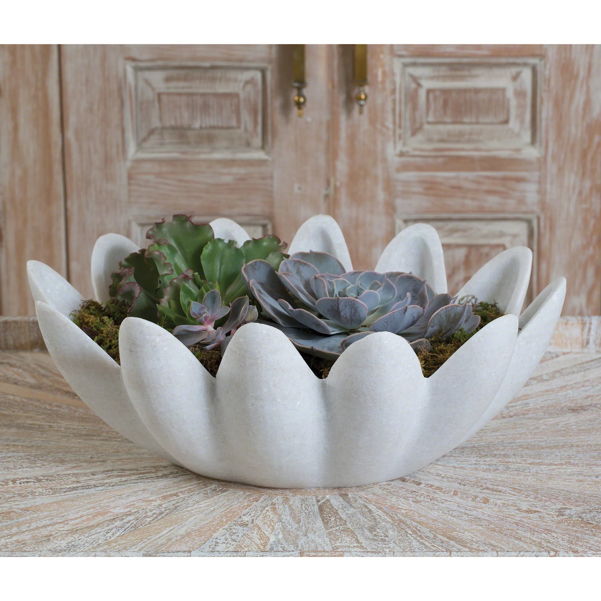 Gingerleaf Bowl by Global Views. Made from marble in a coastal style.