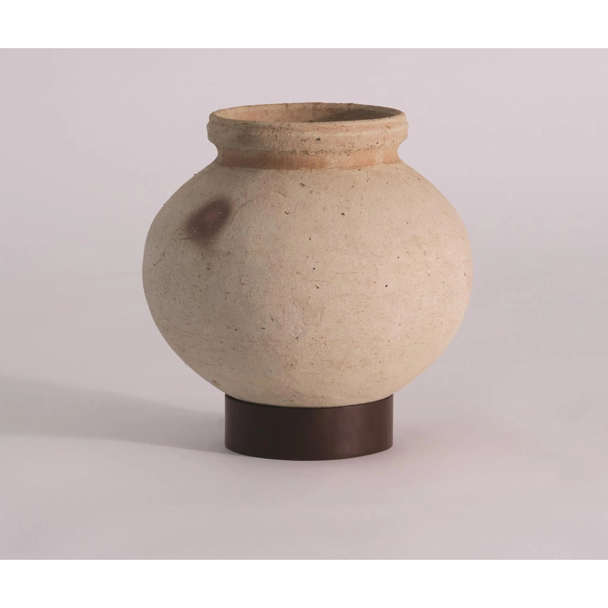 Desert Water Pot with Base by Global Views in burnt wax. Made from iron, terracotta in a rustic style.