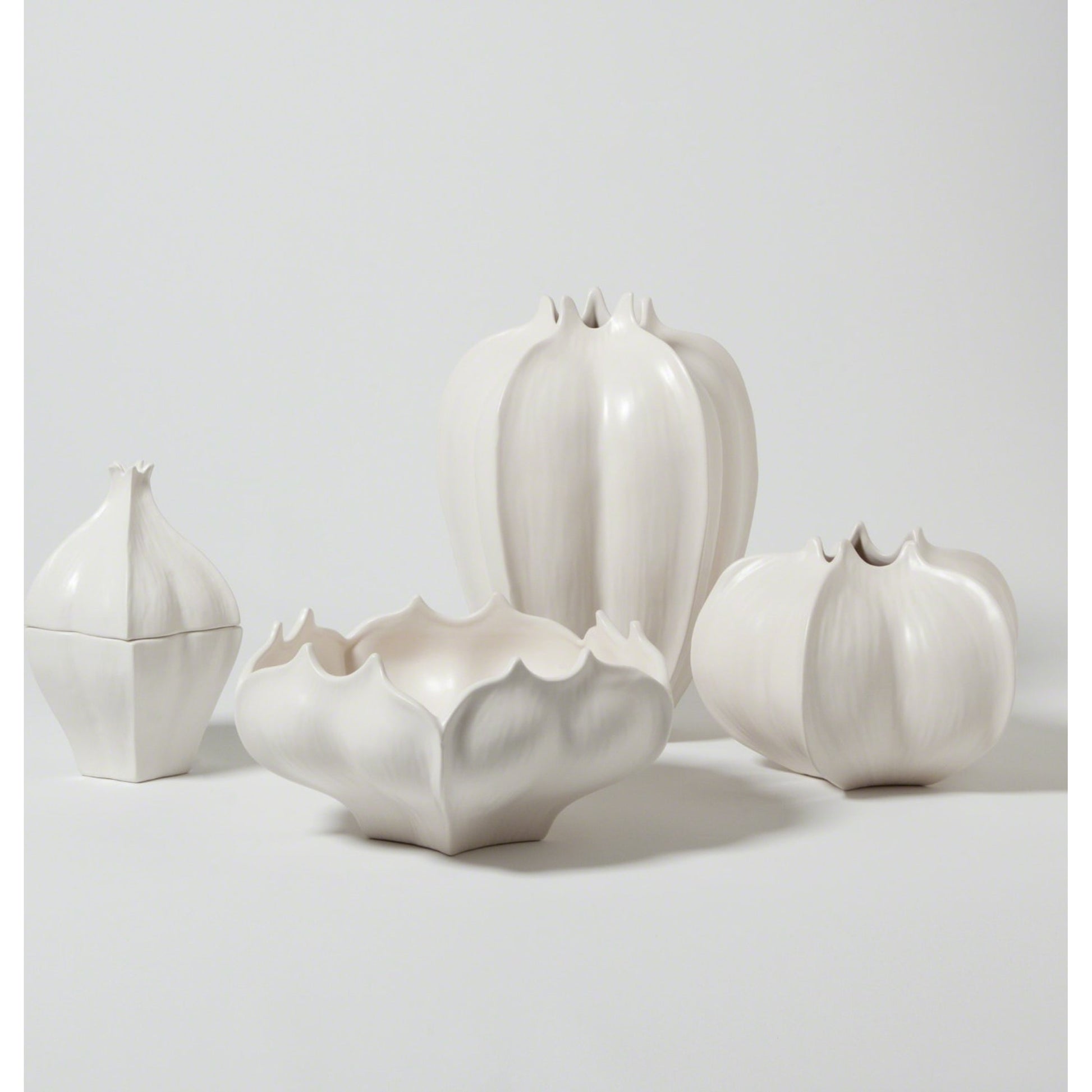 Star Fruit Vase by Global Views. Made from ceramic in a coastal style.