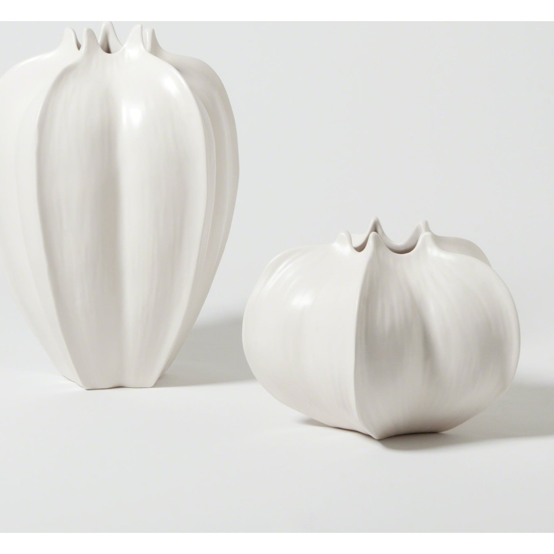 Star Fruit Vase by Global Views. Made from ceramic in a coastal style.