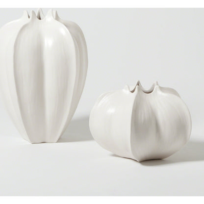 Star Fruit Vase by Global Views. Made from ceramic in a coastal style.