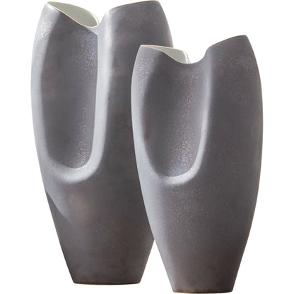 Oxus Pinched Vase by Global Views. Made from porcelain in a eclectic & global style.