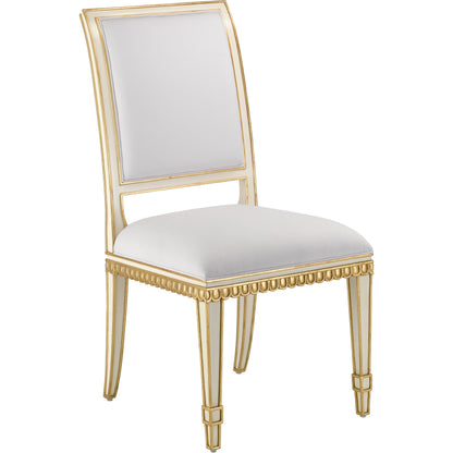 Ines Chair by Currey and Company in mixology moonstone and ivory, antique gold. Made from mahogany in a transitional style.