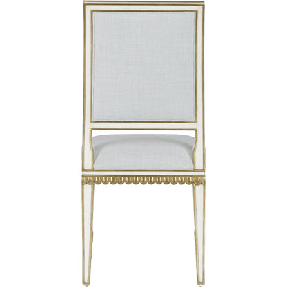 Ines Chair by Currey and Company in mixology moonstone and ivory, antique gold. Made from mahogany in a transitional style.