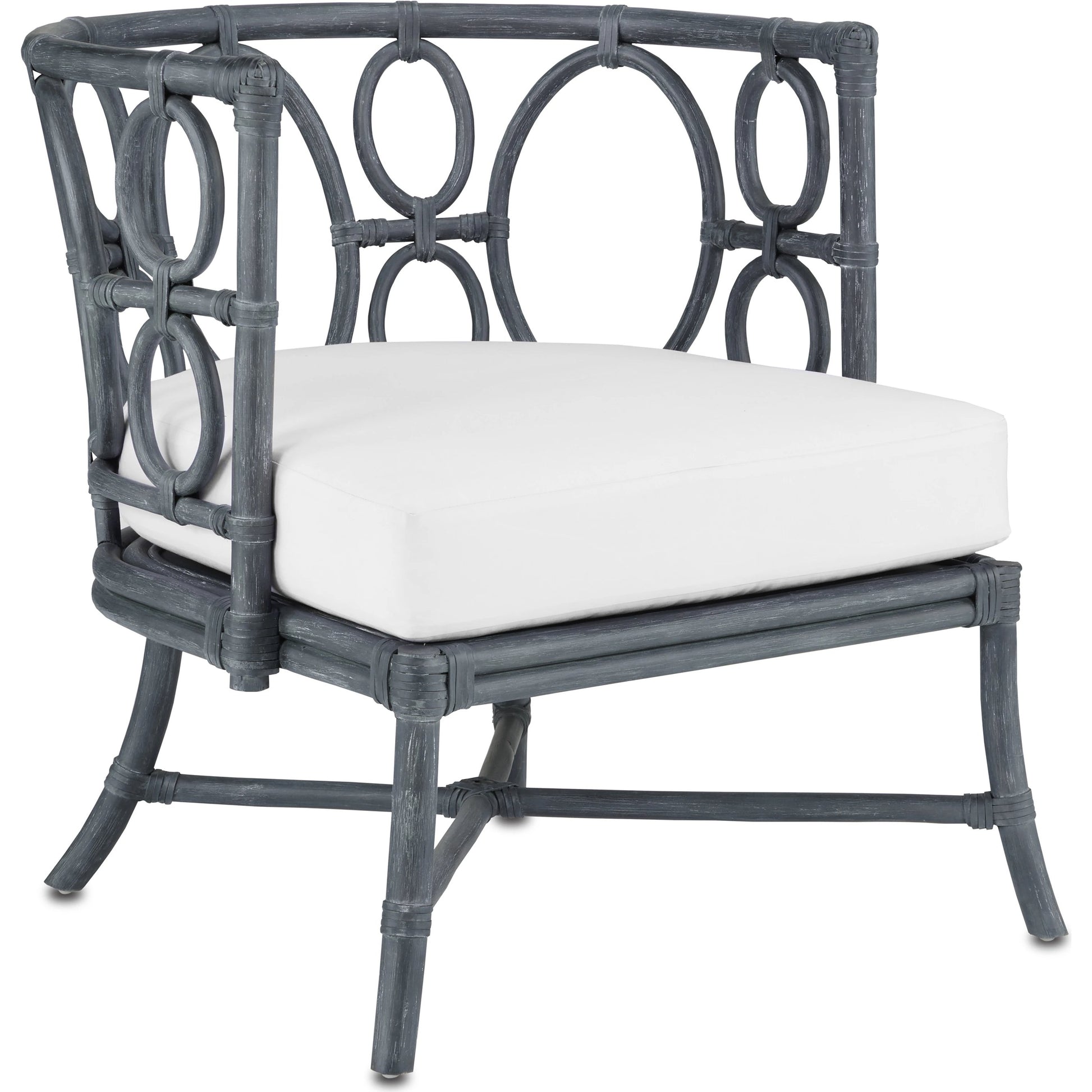 Tegal Chair by Currey and Company in vintage navy, indigo. Made from rattan, plywood, fabric, foam in a coastal style.