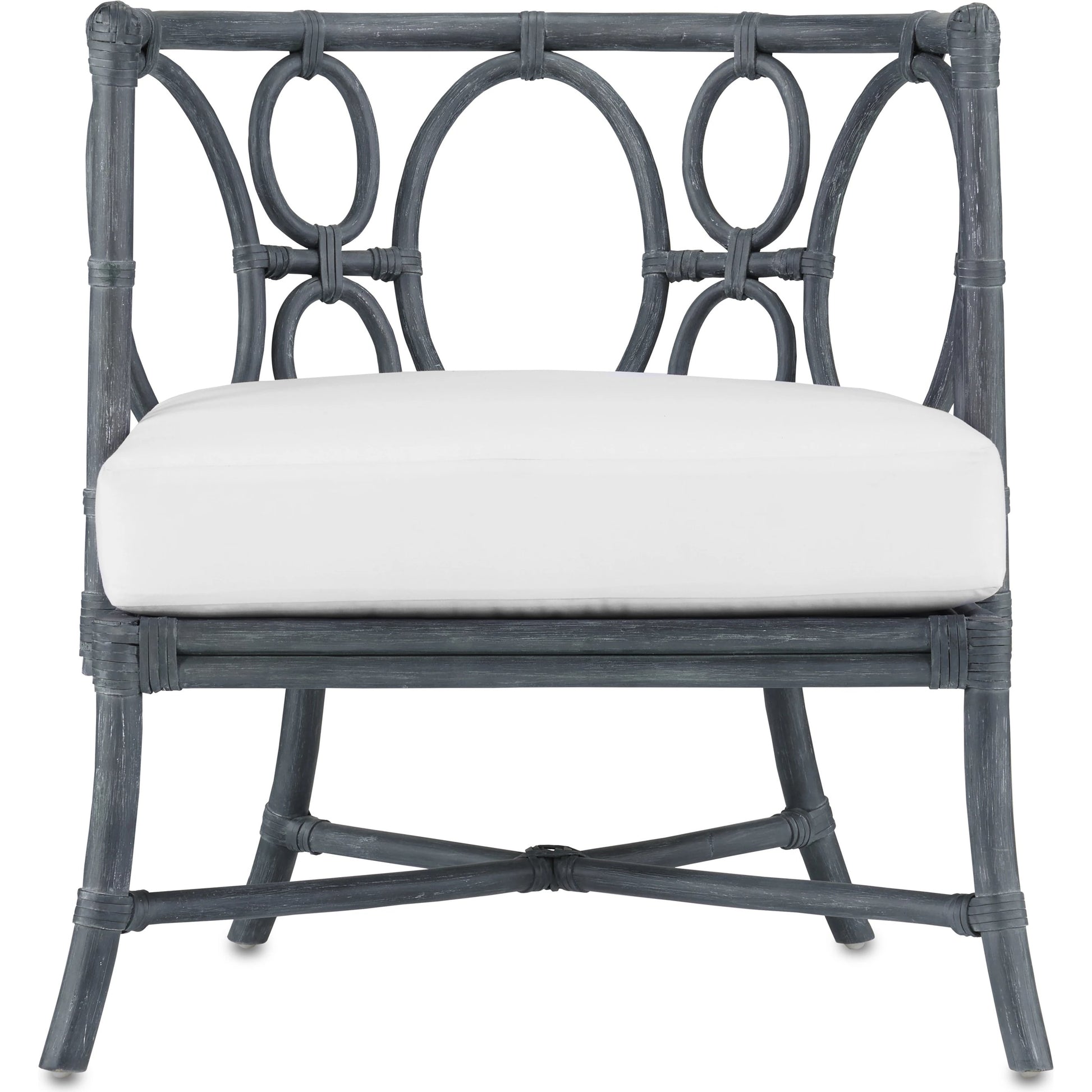 Tegal Chair by Currey and Company in vintage navy, indigo. Made from rattan, plywood, fabric, foam in a coastal style.