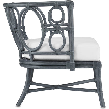 Tegal Chair by Currey and Company in vintage navy, indigo. Made from rattan, plywood, fabric, foam in a coastal style.