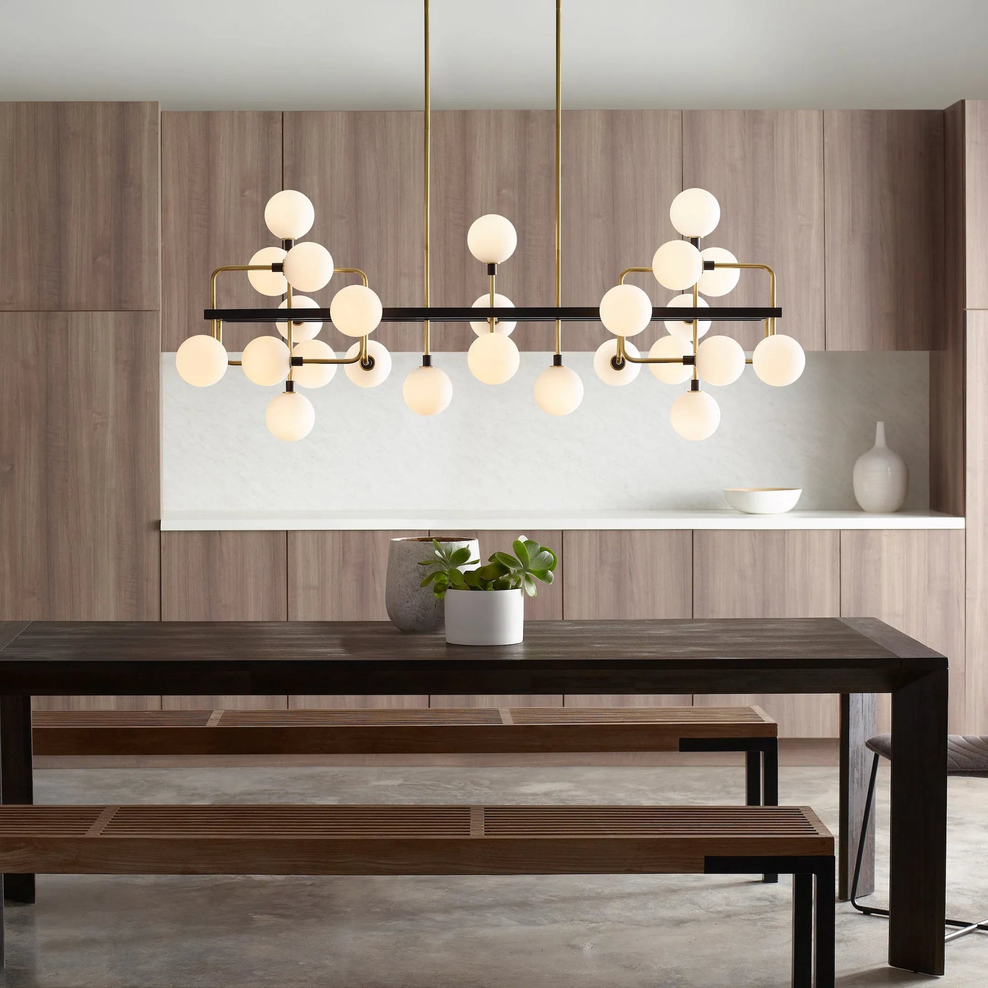 Viaggio Linear Chandelier by Tech Lighting. Made from metal in a modern style.