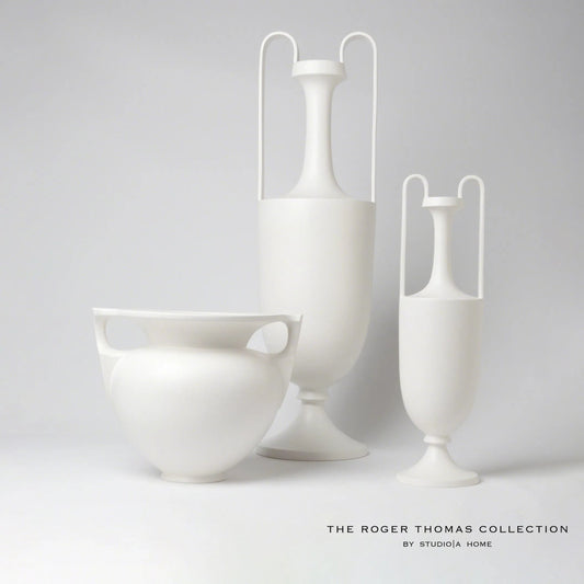Elongated Grecian Amphora by Global Views in matte white. Made from ceramic in a transitional style.