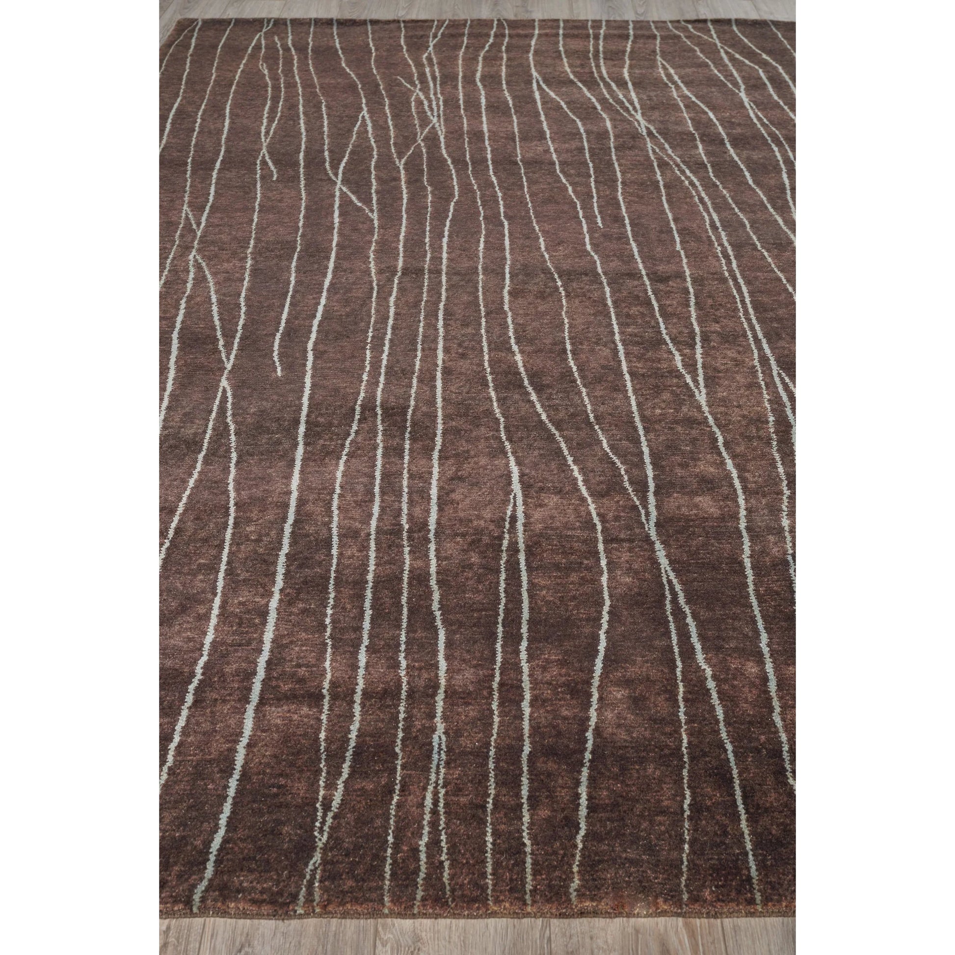 Metro 7033 Rug by Exquisite Rugs in brown. Made from new zealand wool in a unique style.