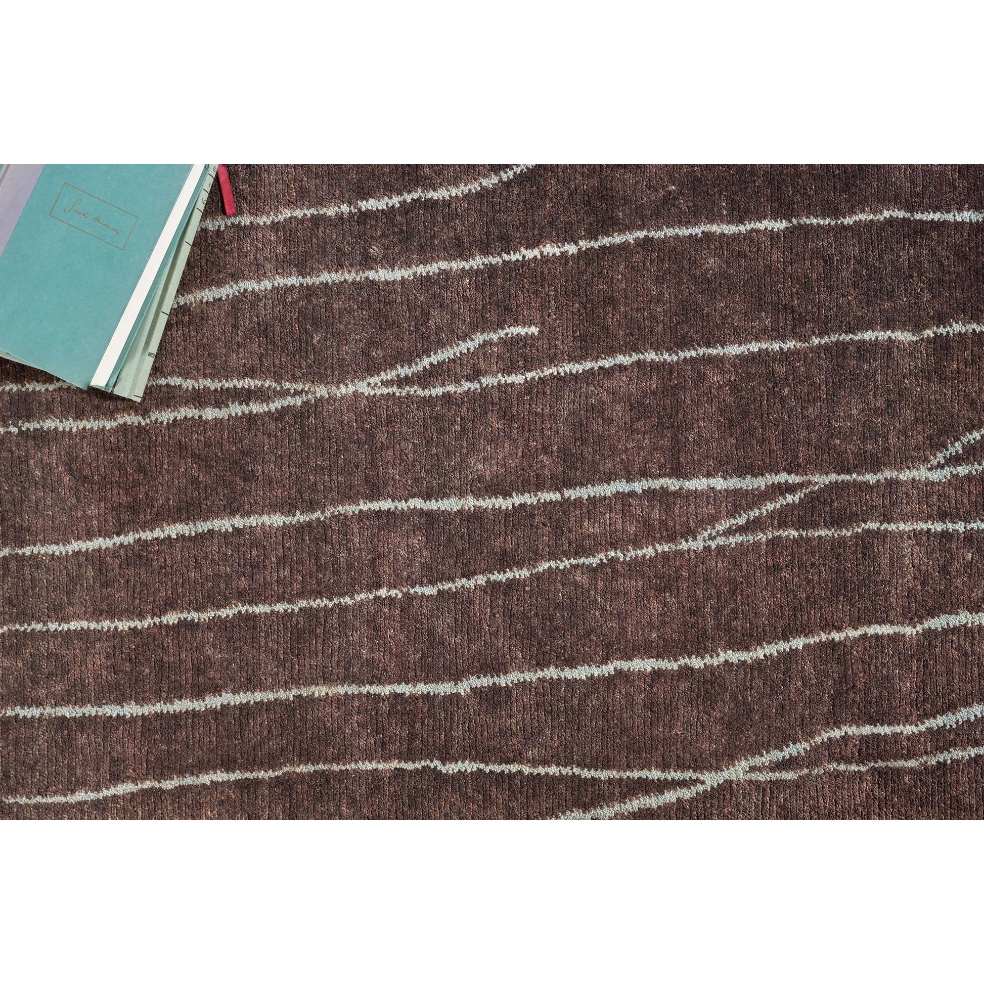 Metro 7033 Rug by Exquisite Rugs in brown. Made from new zealand wool in a unique style.