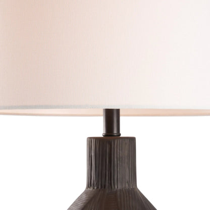 Furrow Lamp by Chelsea House in matte black glaze, clear. Made from unique in a modern style.