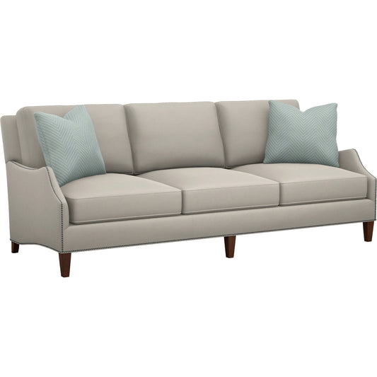 Ashton Sofa by Lexington in tan and brown. Made from mahogany, fabric in a unique style.