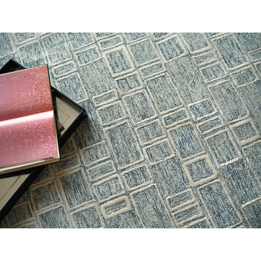 Soho 7137 Rug by Exquisite Rugs in blue, ivory. Made from new zealand wool in a unique style.