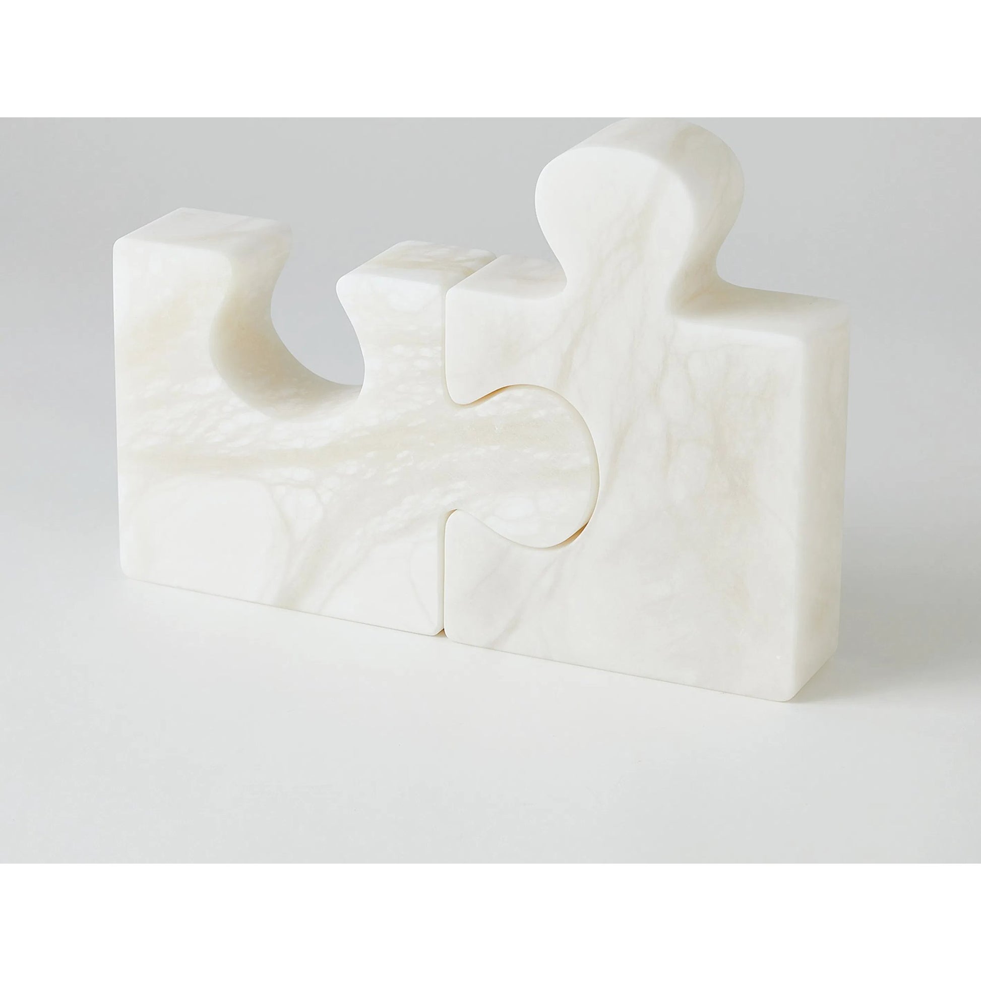 Alabaster Jigsaw Bookends by Global Views. Made from alabaster in a eclectic & global style.
