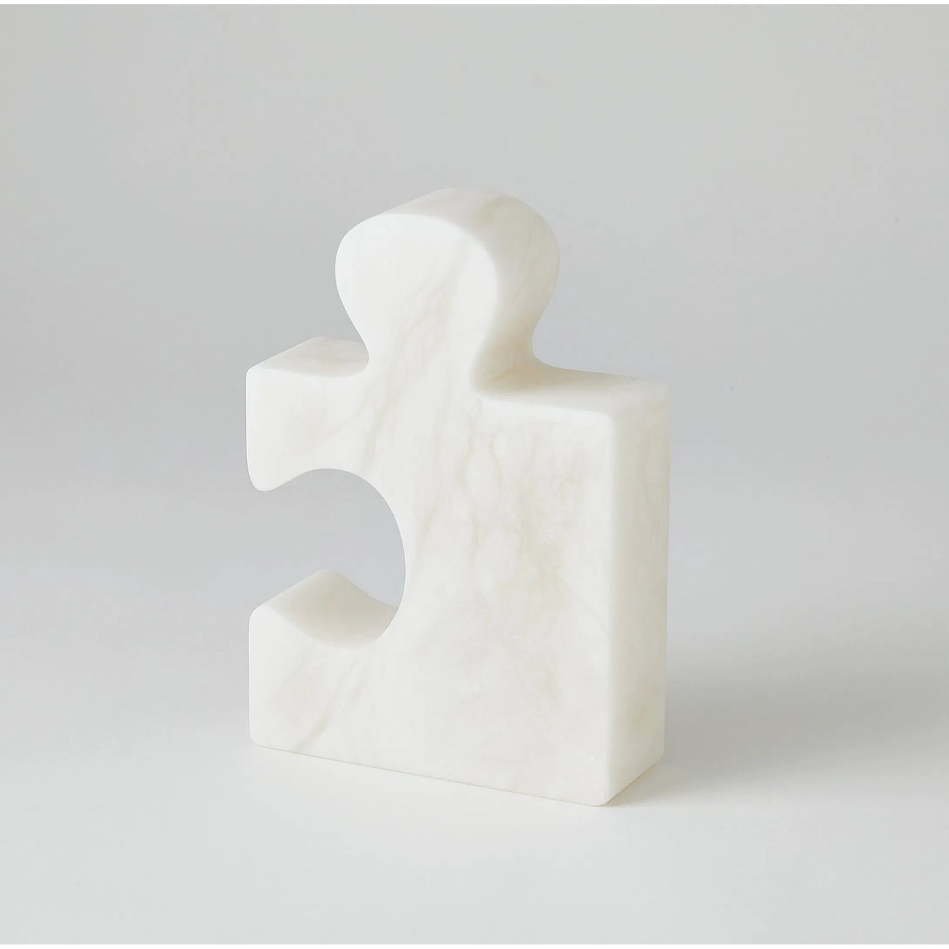 Alabaster Jigsaw Bookends by Global Views. Made from alabaster in a eclectic & global style.