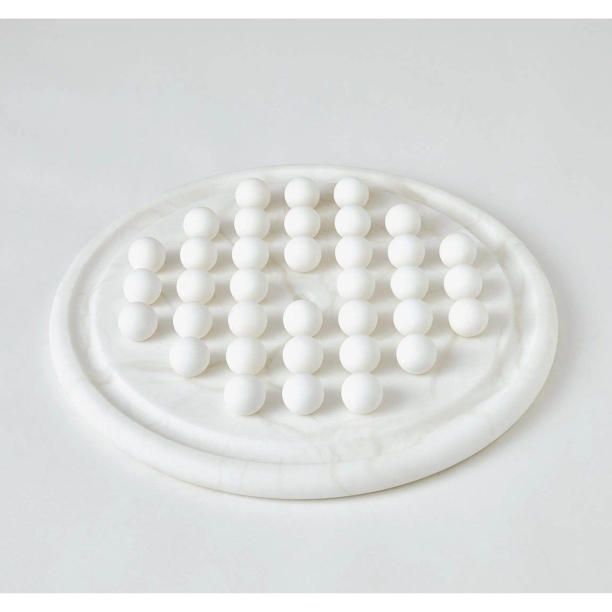 Alabaster Solitaire Game Set by Global Views. Made from alabaster in a modern style.
