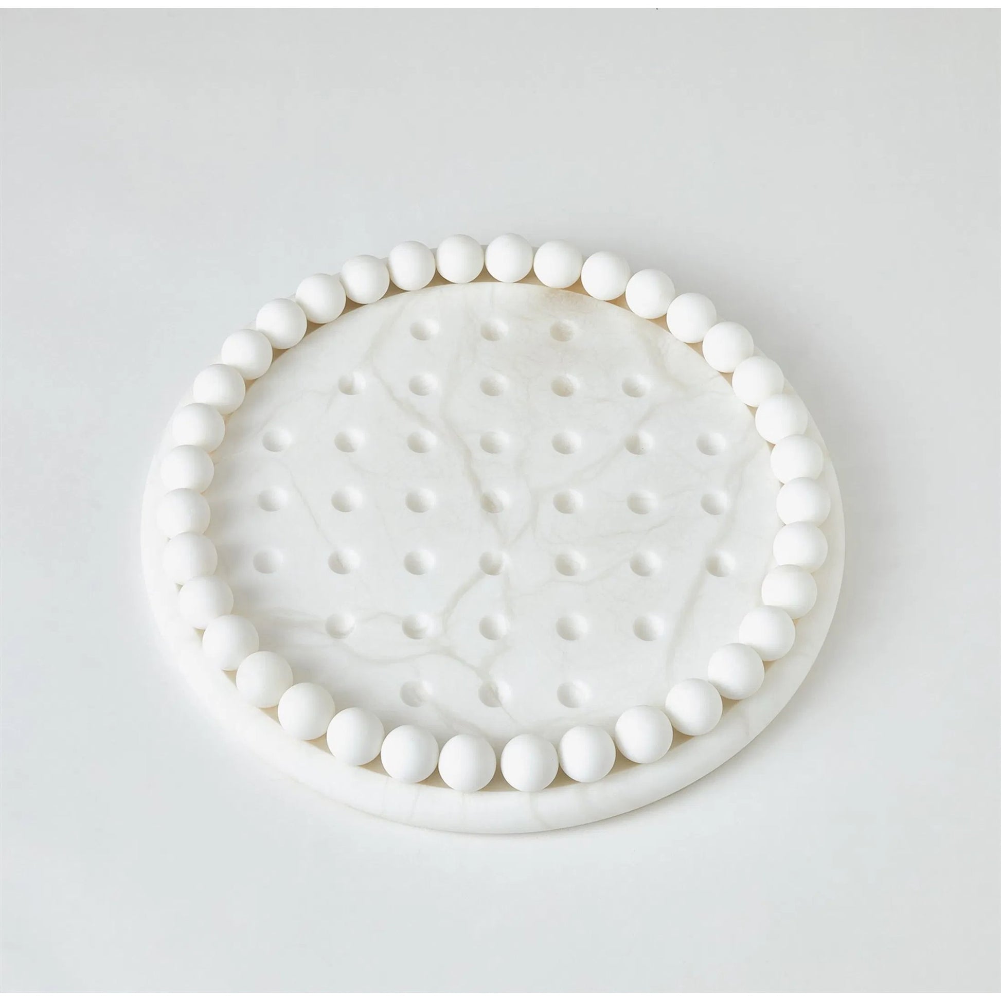 Alabaster Solitaire Game Set by Global Views. Made from alabaster in a modern style.